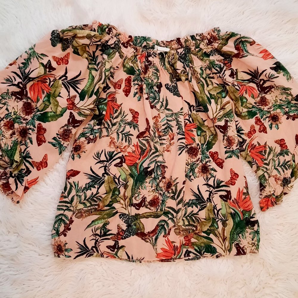 Sweet floral blouse with angel sleeves